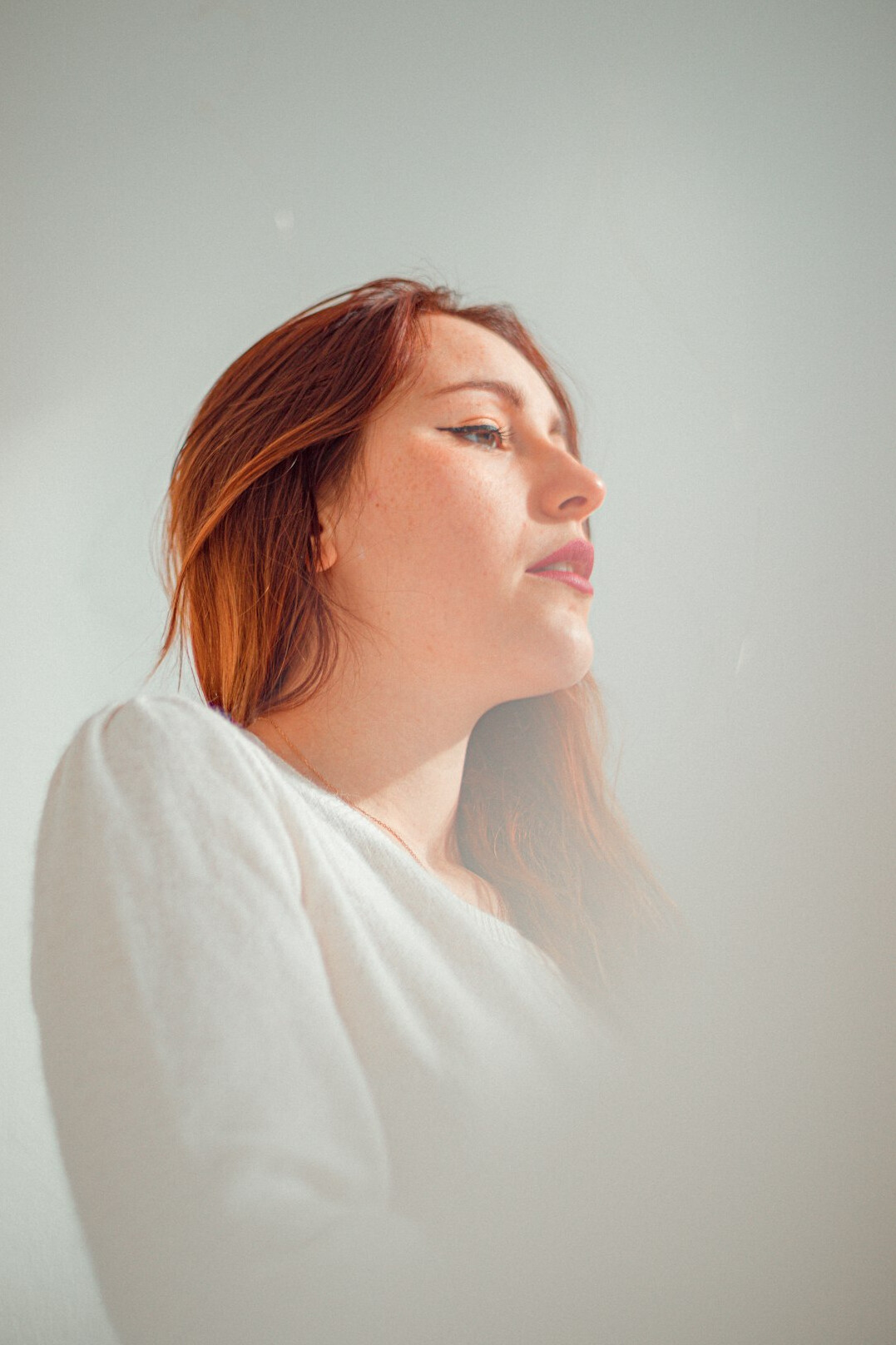 Portrait of a young woman with a calm smile